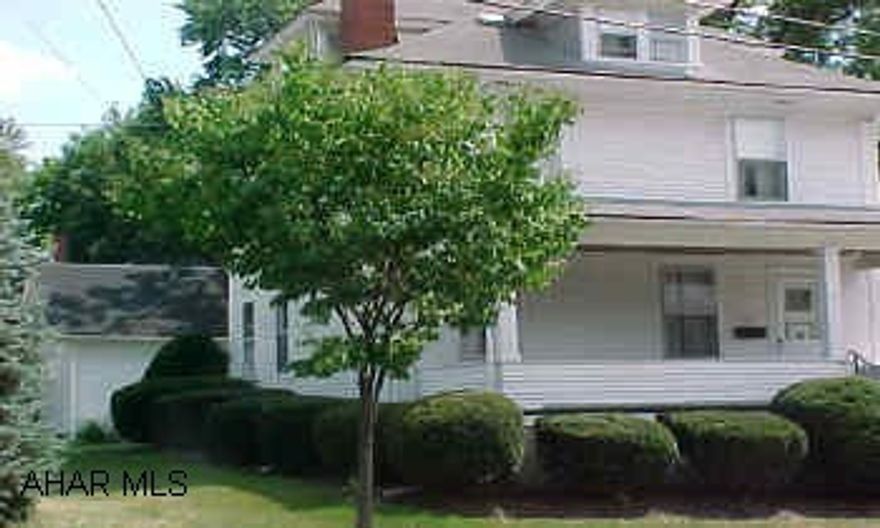 Nice 2.5 story frame in the Boro with a brick FP, CA, and BA and all natural woodwork.