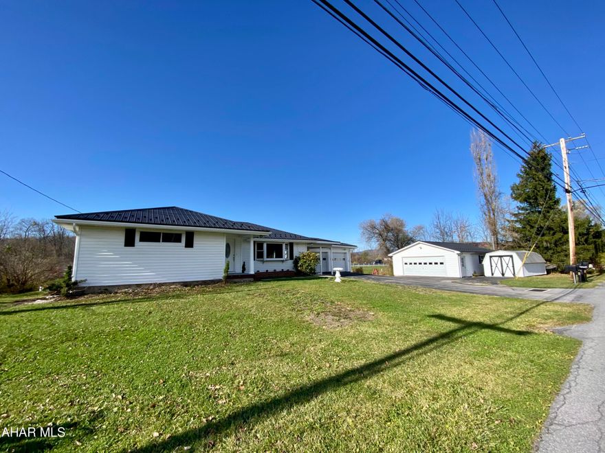 Situated on just over half an acre in Bellwood School District this 3 bedroom 1.5 bath home is completely gutted and remodeled for you to move in.  With first floor living, an open concept and natural light there is so much to offer.  The exterior features vinyl siding, a new metal roof, a rear deck, 3 season room, 3 car garage, shed, and flat lot. Mechanicals are all brand new. See list of improvements and schedule your private showing today.
