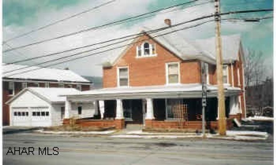 Traditional home, wraparound porch, nice yard, outbuilding, grape arbor, walk-up attic, enclosed back porch, original woodwork, pocket doors, whole house fan, woodburner. Easy commute, close to schools and shopping.