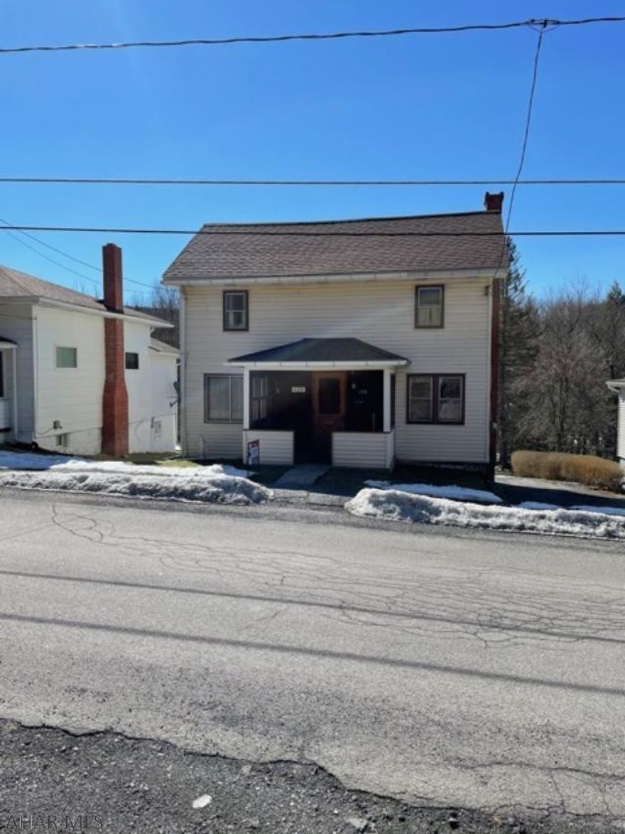 Why pay rent when you can own with this great starter home.  First floor of the home has a living room, an eat in kitchen with plenty of cabinets and counters for meal prep, full bath and two storage areas.  The second floor bedrooms have new dry walled ceilings and lighting.  Furnace has been serviced every year, hot water heater and roof new in 2007.  Enjoy the peaceful sounds of the stream in the back yard all year long.  Nice lot.