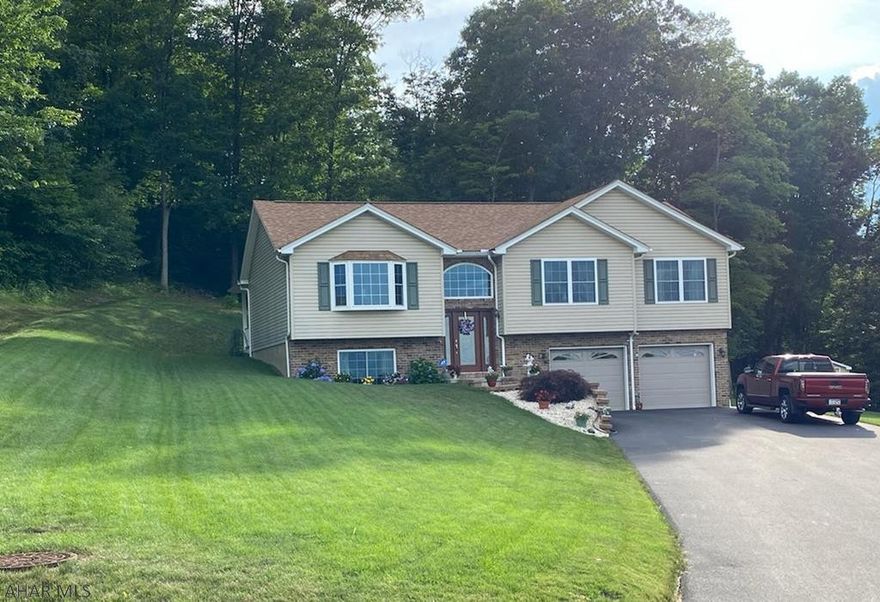 Whether you are looking for your first home, your forever home, or somewhere in-between, this home is a must see. Nestled in a quiet, rural setting on 3/4 of an acre overlooking Freedom Township, this immaculately cared for home offers 3 bedrooms, 2-1/2 bathrooms, and an attached, oversized 2-car garage just for starters. The eat-in kitchen boasts custom oak cabinetry, stainless steel appliances, and a large, must-have pantry! This home has storage space in abundance. Leading outside, the covered back deck offers a peaceful and private outdoor space to gather or simply unwind. At the end of the day, this home won't be on the market long.  Call for a private showing as the home speaks for itself.