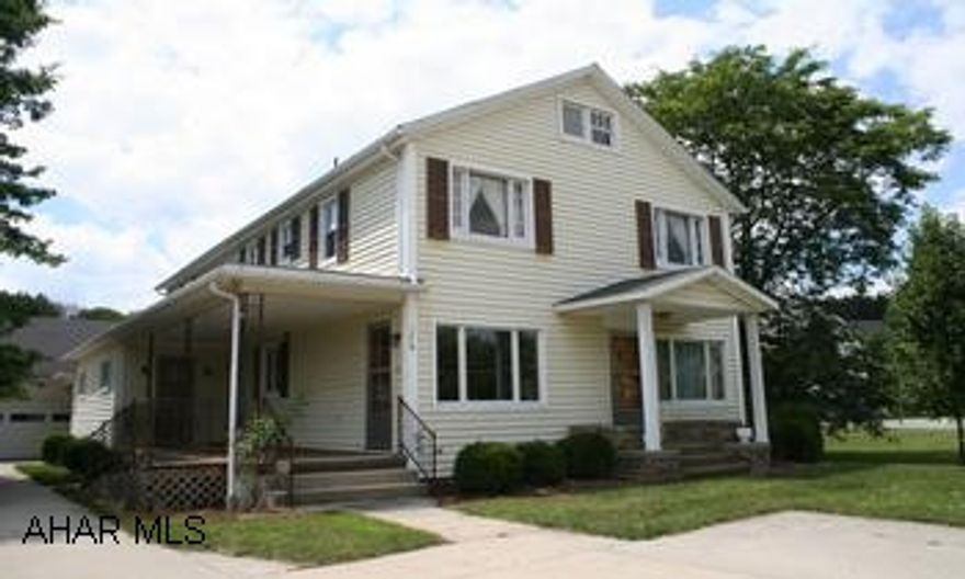 Great  rental investment opportunity! Great rental investment opportunity! 2-story vinyl-sided house with shutters; has 2 appartments with separate entrances. 1st floor apt has 2BR/1 full bath, den living room, eat-in kitchen, heat pump. 2nd floor apt has 3BR/1 full bath, kitchen, living room, den , economic electric heat. Thermopane windows, some hardwood floors, spacious yard. Large detached 3-car garage with 16'x29' workshop and electricity.