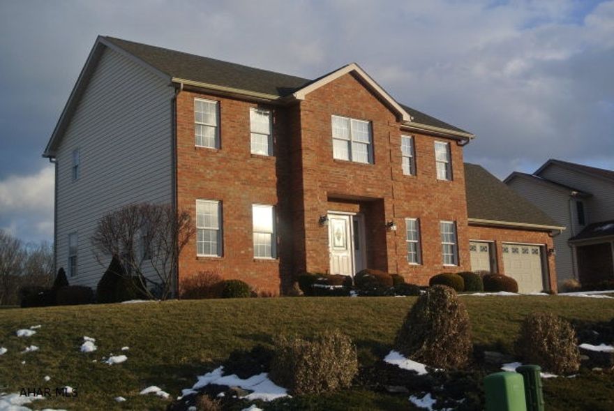 BELLWOOD-ANTIS SCHOOLS!  This very spacious Colonial home in PineCroft Estates is just Spectacular!  The very generous room sizes just seem to flow perfectly, from the very large eat-in kitchen, into the huge Family Room!  It also offers a nice formal Dining room,  oversized 2 car garage, screen-in sunporch, a half bath..... all on the first floor.  Wow!  With many recent updates like New Paint, New fixtures, and the admired Beautiful Landscaping, it makes this home stand out for its price range.  The tremendous finished basement is just another fantastic amenity.  And, just like everything else in this home, it was professionally done with plenty of lighting, outlets, heat, a/c, and Ceiling fans.  This home is absolutely MOVE-In ready. Great views, Great Neighbors, and Great location!