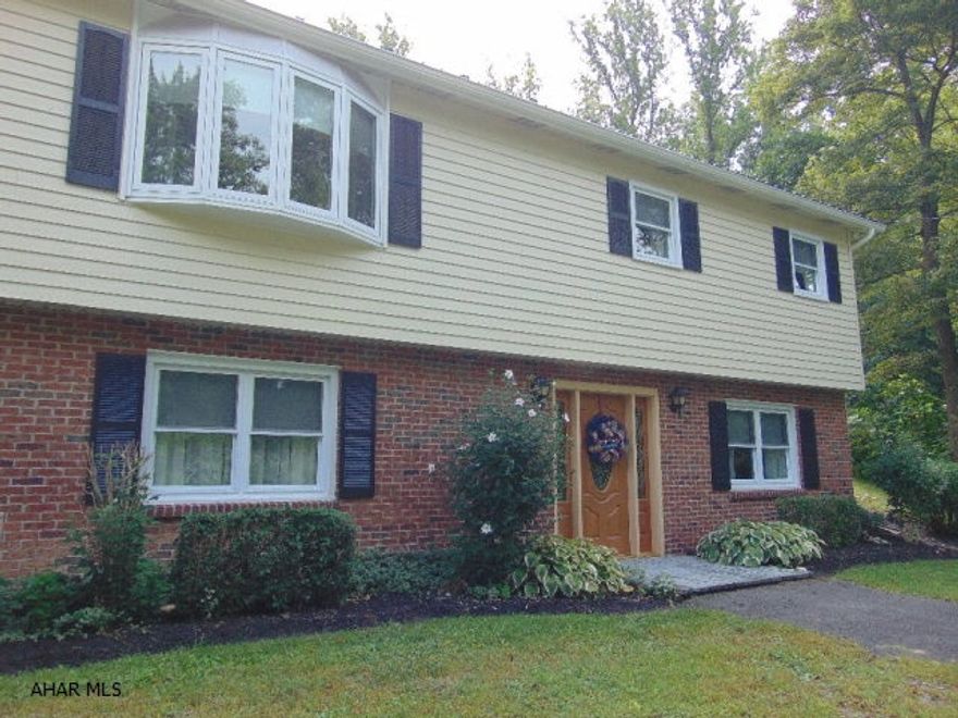 Endless options for this incredible property! 4 bedrooms & 2 baths in the main house. 1 bedroom, 1 bath in mother in law suite with separate entrance. Fully functional office area on bottom floor with 3 private offices, a copy room, reception area and half bath. Large 40x72 building with heat, half bath, and numerous work areas. Incredibly well kept with new roof in 2016. Central air with heat pump and oil backup. Extremely private with easy access to US-220. A must see property!