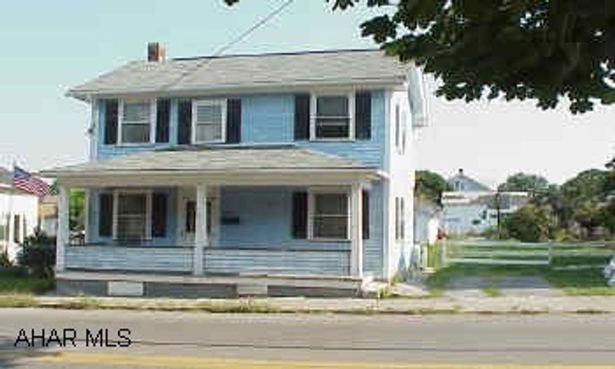 Large house with lots of potential.  Heating system in poor condition.  Large 2 car garage with store room.