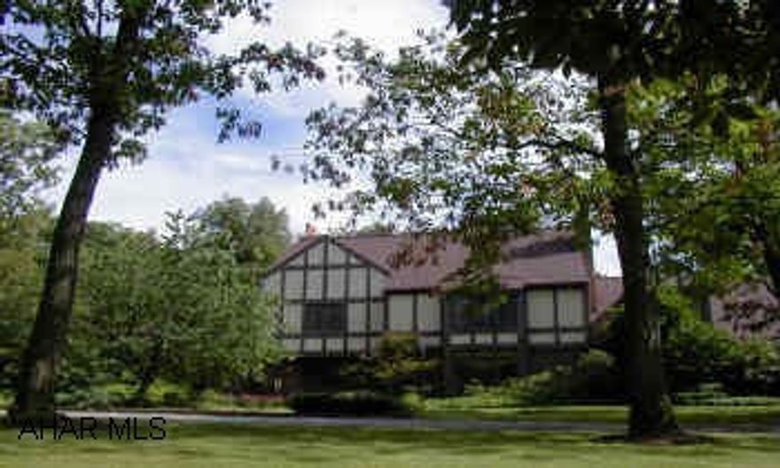 Rt.164 to M-burg,at light onto Rt.866N.Go 3.6 mi.,to Walters Lane,follow lane,bear R.at split at top. Wonderful 2 story Tudor home with expansive great roomw/vaulted beamed ceilings,unique brick wall w/fireplac&,wt bar, sunroom,formal living room w/marble fp, 4th Br  could be separate living quarters w/additional entrance. Terrific for entertaining w/heated pool,hot tub,volleyballl ct and more.Oil fired radiant floor heat on main floor ceramic floors, not sunroom. Call for additional list of amenities and brochure.