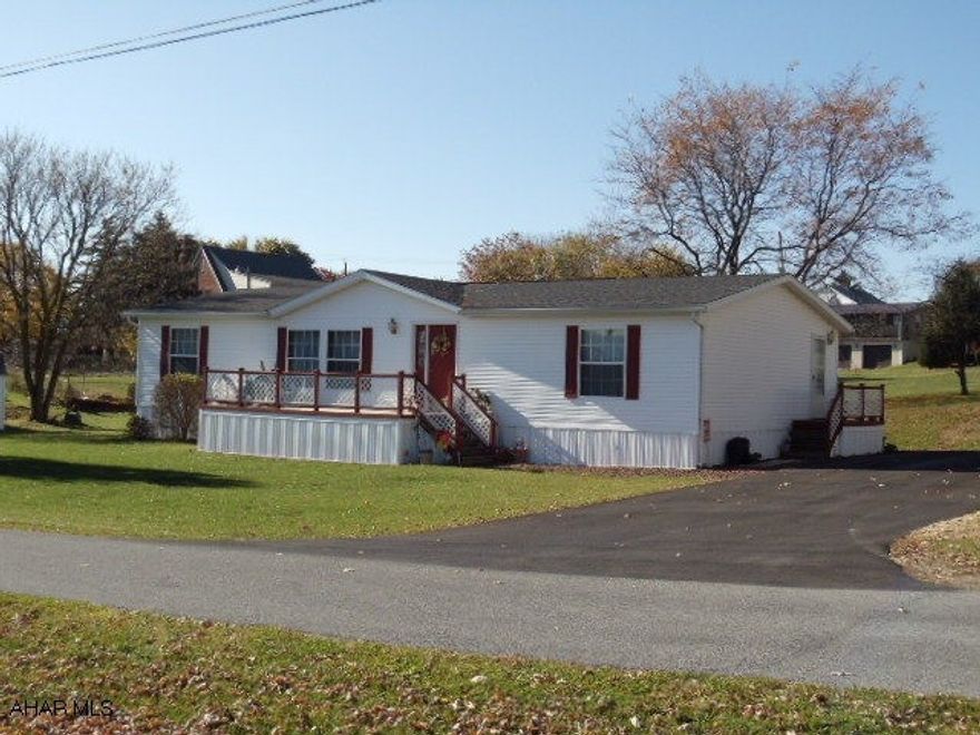 Beautiful 2000 Doublewide with skylight, vaulted ceiling, garden tub and separate shower in master bathroom. Nice level lot and blacktop driveway. Own your own land instead of paying Lot Rent.  #J-038