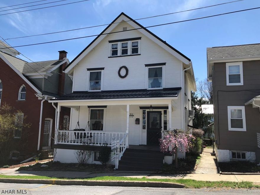 Unique & cozy home In Hollidaysburg Borough. Small pantry off of the kitchen with floor to ceiling cupboard & large sink. Look out the window to a pond with fish. A fireplace with a hut & vines covering the roof to have your backyard get togethers. This home has 3 bedrooms & a walk in attic that would make an extra 1 or 2 bedrooms. Nice size dinning room overlooks private, beautifully landscaped fenced in yard. Living room has old fashioned pocket doors that give you privacy if needed. Exterior of this home features a two year old metal roof, new windows, fresh paint & new gutters.Interior includes fresh paint, newer carpet, newer pipes in the bathroom, as well as from the street to the home & new hot water tank. All hardwood floors under carpet. Seller will consider all reasonable offers!