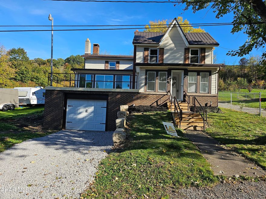 Large 4 bedroom home completely remodeled! Home has a family room, sun room, master with attached full bath, first floor laundry, huge kitchen, with new appliances, attached garage, large yard, 1st floor office, enclosed porch, 1st floor half bath, new floors, paint, walls, roof, windows and so much more! This is an amazing home!