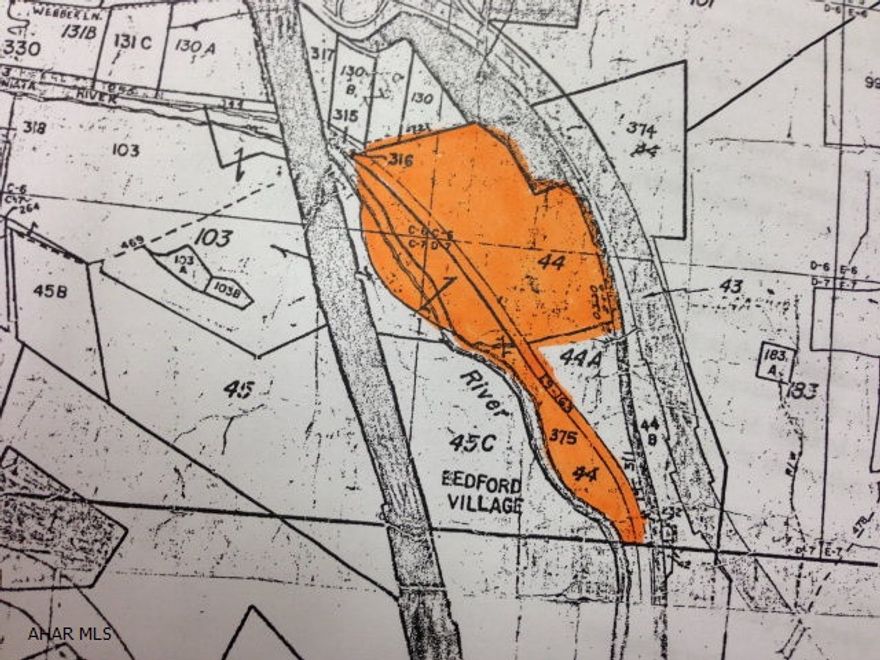 Ready for development with 700 ft. of road frontage on Business Rt. 220.  Public water, sewer and gas available.  Land in on both sides of the Juniata River. Complete survey done and nice river front property for camping, RV site, recreational cabin or building site. 2.5 acres buildable.