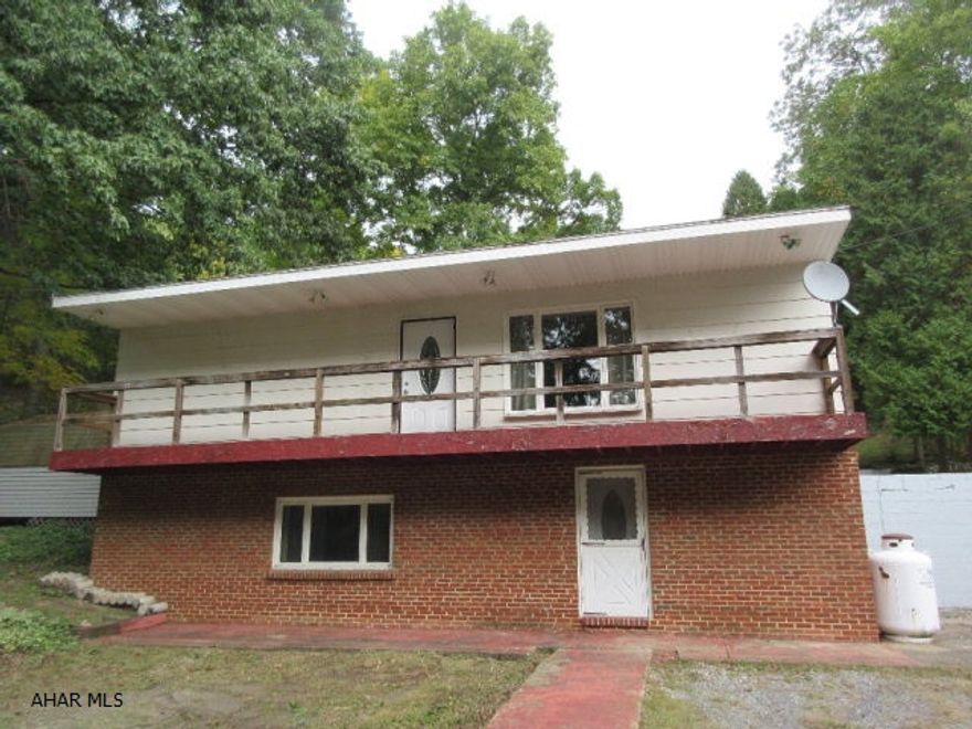 Private house in woods, get away from it all on almost 2 acres wooded and open. 4 Bedrooms, 2.75 Bath, large, open Family Room. Located 1/2 mile from PSU Altoona. Was used as an owner occupied housing that paid for itself with current owners. Priced to sell! Owner willing to give $1000 back at closing toward refrigerator with the right offer.