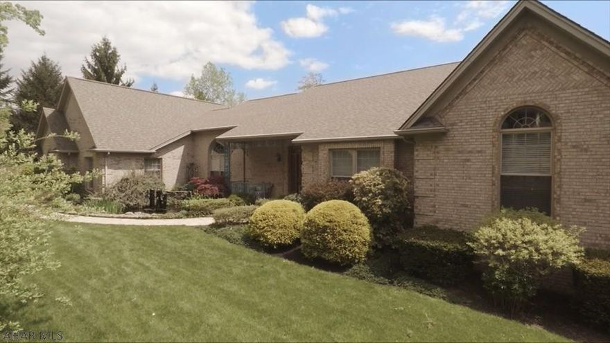 Custom professional 3D tour attached to this listing so you can view the entire house online. Indoor Lap pool and sauna. Extra wide hallways and doorways in a ranch one floor living. This custom home features entertaining area including a wet bar and kitchen with granite countertops in the walkout basement. Wine storage and cedar closet.Large custom kitchen with double oven. Two fireplaces and a spacious master bedroom and bathroom with jacuzzi tub even includes its own walk out patio. Koi pond with beautiful landscaping front and rear. Very private setting yet close to everything. Garage is heated with a tile floor. Fenced in dog area. 400 amp electric