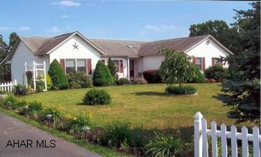 Large updated home on 1.9 acres, close to schools. Finished basement w/full kitchen, family room, rec room, bath. Includes appliances, foyer, skylights, beautiful extra large covered deck, manicured lawn, mature planting, lovely garden areas.