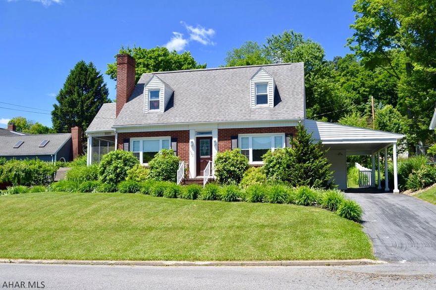 A wonderfully updated brick cape cod in Historic Bedford PA.  Truly turn key, this home has refinished hardwood floors throughout the first floor, renovated kitchen with granite counters, stainless appliances and mosaic back splash.  Full dining room with lots of natural light and a main floor living room which exits to a covered side porch.  At the rear of the house, the sun room opens to a spacious vinyl fenced back yard.  Bedrooms and custom tile bathrooms on each floor make this ideal for any family.  Newly remodeled finished basement with walkout access to the carport.   A must see home... Give us a call today!