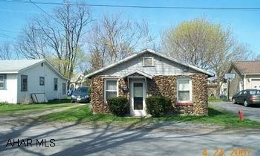 Cute and Cozy with addition in rear.  Wall mount space heaters only.  Needs TLC.