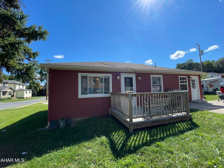 Cute rustic cottage-like 1 story home. Many new updates in this 2 bedroom property. New 100amp electric panel. New water line, siding, concrete parking area. Also has new bonus room addition, back-splash, and central AC all on a nice corner lot.