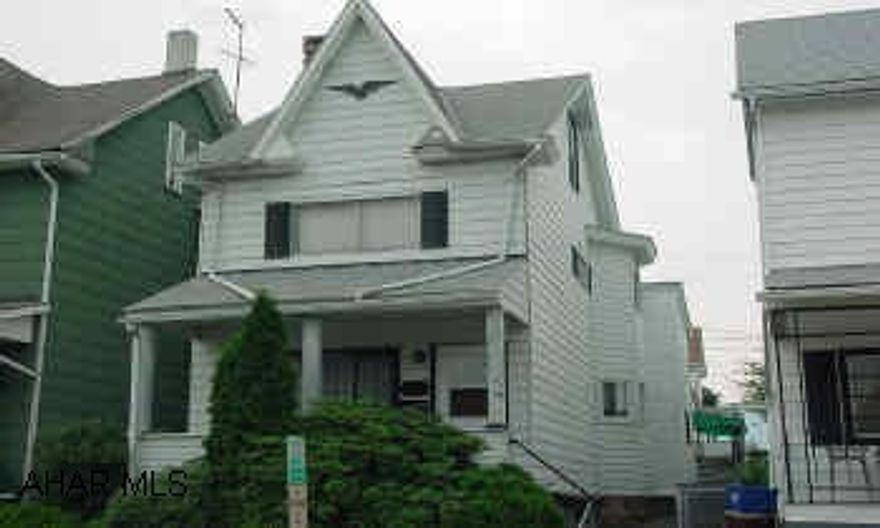 2.5 STORY 3-4 BEDROOM HOME WITH UPDATED MECHANICS AND LOW TAXES!  GOOD 3-4 BEDROOM, 2 FULL BATH HOME ON A LEVEL BLOCK. HAS GOOD UPDATED MECHANICS, YARD WITH SHED, AND 2 CAR CARPORT IN REAR. YEARS AGO IT WAS USED AS A DUPLEX. "AS IS" SALE. CONTACT MIKE MANGIA 941-3997.