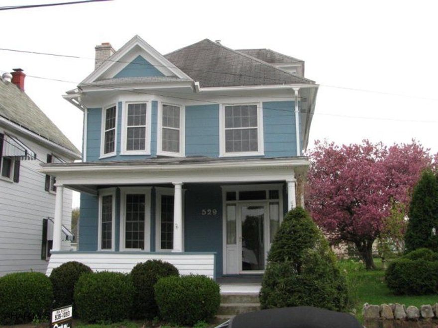 Great location for this 4-5 bedroom Tyrone home, LR., w/ fireplace. DR., w/ bay window, EIK., w/ appliances. Recently updated gas hotwater heat w/ option for coal or wood too! New windows, paint, and flooring. Fenced yard w/ patio and detached garage, All within walking distance to park and football field!