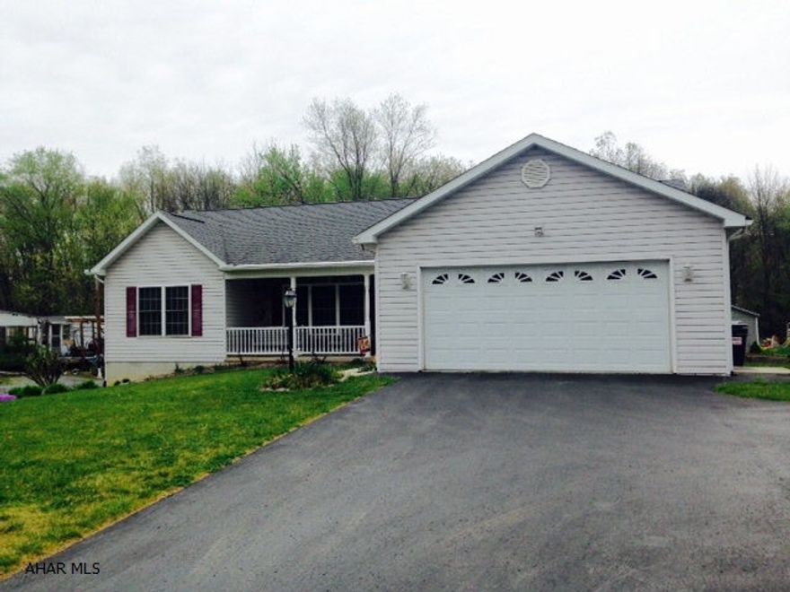 Immaculate home built by Trademark. Absolutely move in ready. Minutes from I-99 and PA Turnpike. Open floor plan with cathedral ceilings. Large kitchen with center island, bar area and skylights. Nice deck overlooking the back yard that borders Dunnings Creek. First floor laundry. Master suite with his and her walk-in closets and master bath. Open basement with upgraded electrical, radon system. Call now for this amazing buy! Cash buyers only. Sold as is.