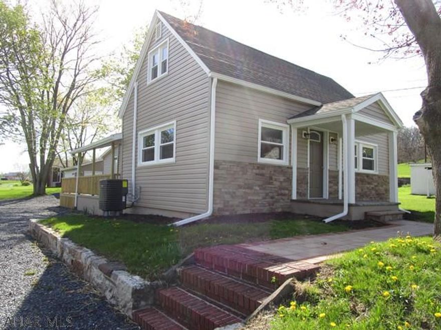 If you're looking for a nice home this is it!!  This cape cod has been remodeled from top to bottom.  Open concept on main level, kitchen w/ hickory cabinets & stainless appliances, light & airy LR, DR with sliding patio door to the covered side porch, 1/2 bath, laundry room and first level master suite.  Master bedroom has a vaulted ceiling, door to the deck for that morning coffee, walk-in closet and master bath.  Second level offers two bedrooms and a full bathroom.  New roof, siding, windows, soffit/fascia, gutters, insulation, drywall, electric & wiring, kitchen, baths, paint, floor coverings and plumbing.  Recessed lighting throughout, covered porches, deck and new two-car garage.  Large double-lot.  Convenient location and just a short walk to the downtown area.