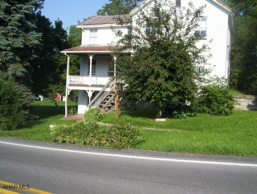 Two-story house with oversized detached garage on 1.38 acres.  Nice property mostly level with mature landscaping and great view.  Corner lot offers nice country setting.  Centrally located and only1.5 miles from NBC schools.