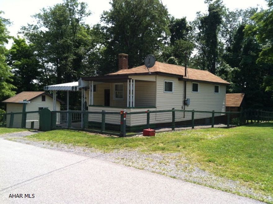VERY MOTIVATED SELLER.  Will consider any and all offers. Lots and lots of LOTS.  Plus a 2 bedroom, 3/4 bath house and many storage sheds.  Large, newer 10' by 10' shed along with 3 additional storage sheds attached to the house.  End of street property with 3 separate lots.  Property with house has large fenced yard backing up to huge wooded lot.  Quietness and tranquility encapsulated in a little piece of heaven.  Individual lot sizes on the deed include one  33' X 50', one 140' X 50' with house, and one mostly wooded lot 143' X 250' (.82 acres).  Can be your private escape from the rat race on a permanent basis or for a weekend sojourn.