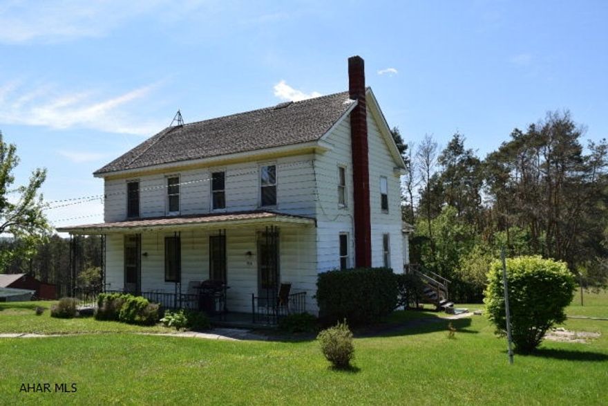 5 Acres with a solid four bedroom home just outside of Portage borough yet conveniently located close to everything in town. This home was originally built as a duplex and could be converted back providing potential rental income. There is an outbuilding for your yard equipment and a quonset hut for parking out of the weather. Land like this does not come available often. Call the listing agent today for details.