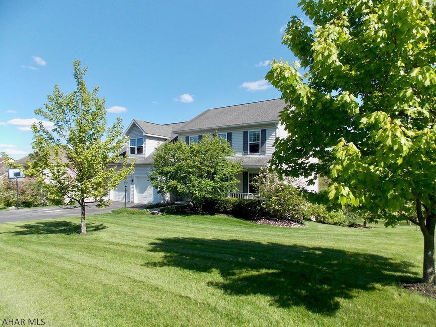 Wow - what a view from the deck of this beautiful home in Pleasant View Estates.  Four large BRs, 2.5 Baths with updates throughout.  New laminate wood floors on the main level and the updated kitchen with stunning backsplash and new appliances are sure to please the new homeowners. The family room on the main level which is open to the kitchen and the one in the basement both have fireplaces to keep you cozy and warm all winter.  Enjoy the great outdoor space this summer and fall on the new deck and patio below.  Having a fire in the fire pit  will be a family favorite activity. This lovely home is in a very desirable location and will not be on the market long.  Don't wait to schedule a showing, give us a call today!