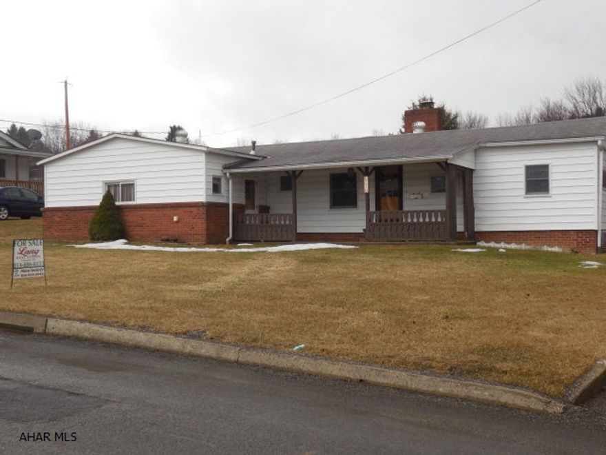 Mylo Park area of Ebensburg. This home is attached to a permanent foundation and has additions to original. It has 3 heat zones. Second bath could be 3/4 bath with some repairs. It features a large 2 car garage plus a work shop. Yard is flat and driveway adds additional parking. A closed breezeway is between home and garage.