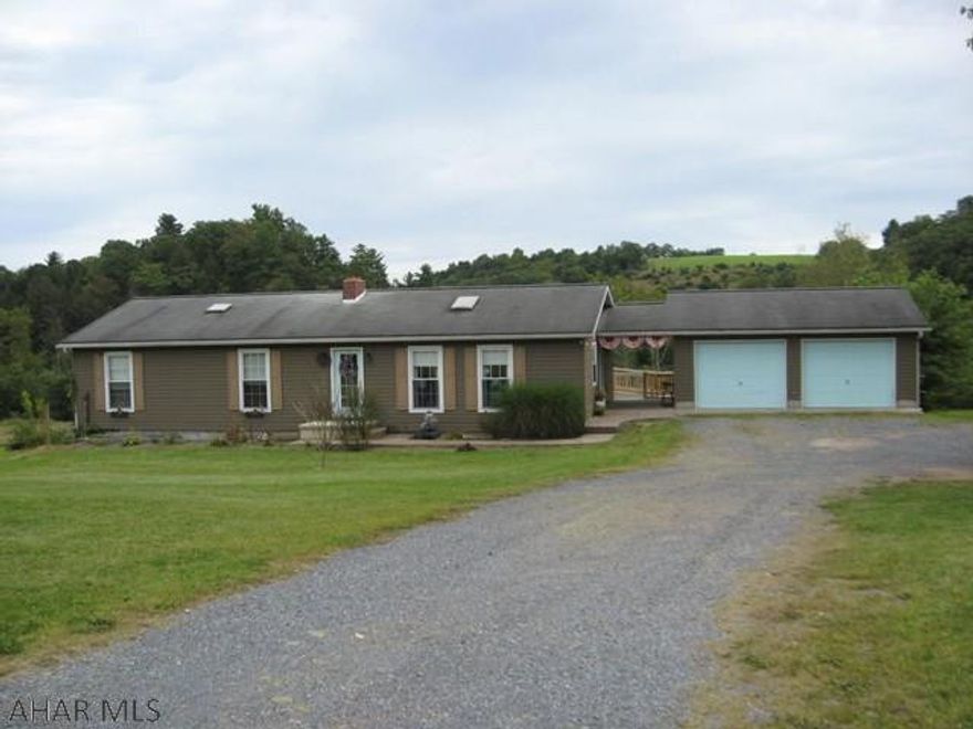 Fantastic home and grounds located along the Raystown Branch of the Juniata River.  This home has it all:  Open floor plan  -  hardwood floors  -  2.25 baths  -  full basement with woodstove and two large bonus rooms for additional space  -  in-ground swimming pool  -  multiple decks for entertaining and relaxing  -  lots of river frontage with easy access to fishing, camping, boating, kayaking on the Juniata River  -  20' x 40' Garage with electric & water, concrete floor, side-wall and overhead lighting for the car enthusiast, plus, attached 2-car garage and 1-car integral garage  -  Run-ins attached to larger garage with fenced pasture for those who enjoy farming.  Conveniently located between Everett and Breezewood for easy access to many major highways.  The possibilities are endless!
