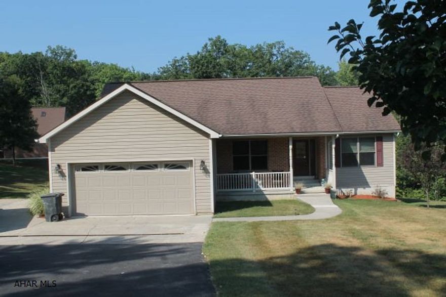 This ranch style home has so much to offer. The master suite has a full bathroom and walk in closet as well as a custom design wood ceiling. There is a dining area as well as an eat-in area off of the kitchen. Walk out the back door to a very large covered patio that over looks all the nature this house has to offer. There is a separate 2 car garage with a walk up second floor for storage. This garage also has its own driveway and outside parking spaces with a shedconveniently located next to it for more storage. The walk out basement is fully finished with a huge family room that has a custom built bar and tile floors. The lower level also offers a bedroom, full bath, and office, and laundry room. This house looks much smaller from the ouside than what it actually offers.