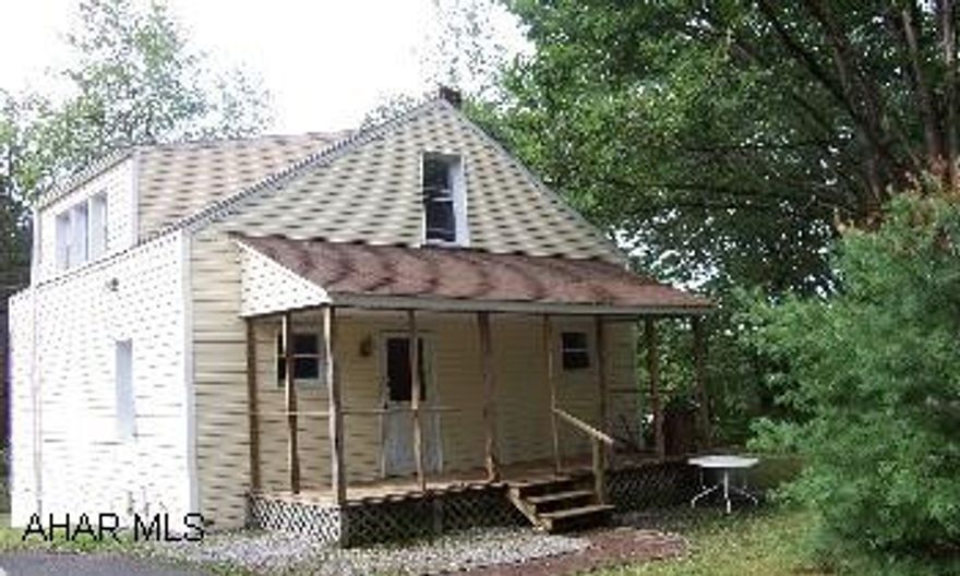 Updated 1.5 story home  in a great rural setting.  From Tyrone, Rt 453 (Janesville Pike) through Janesville, make 1st right after Janesville, house is on the left. School district is Mo Valley. Updated 1.5 story home in a great rural setting. From Tyrone, Rt 453 (Janesville Pike) through Janesville, Make 1st right after Janesville, house is on the left. School district is Mo Valley. Public sewer is in the process of coming through, tap in fee is $1000. Seller may consider owner financing.