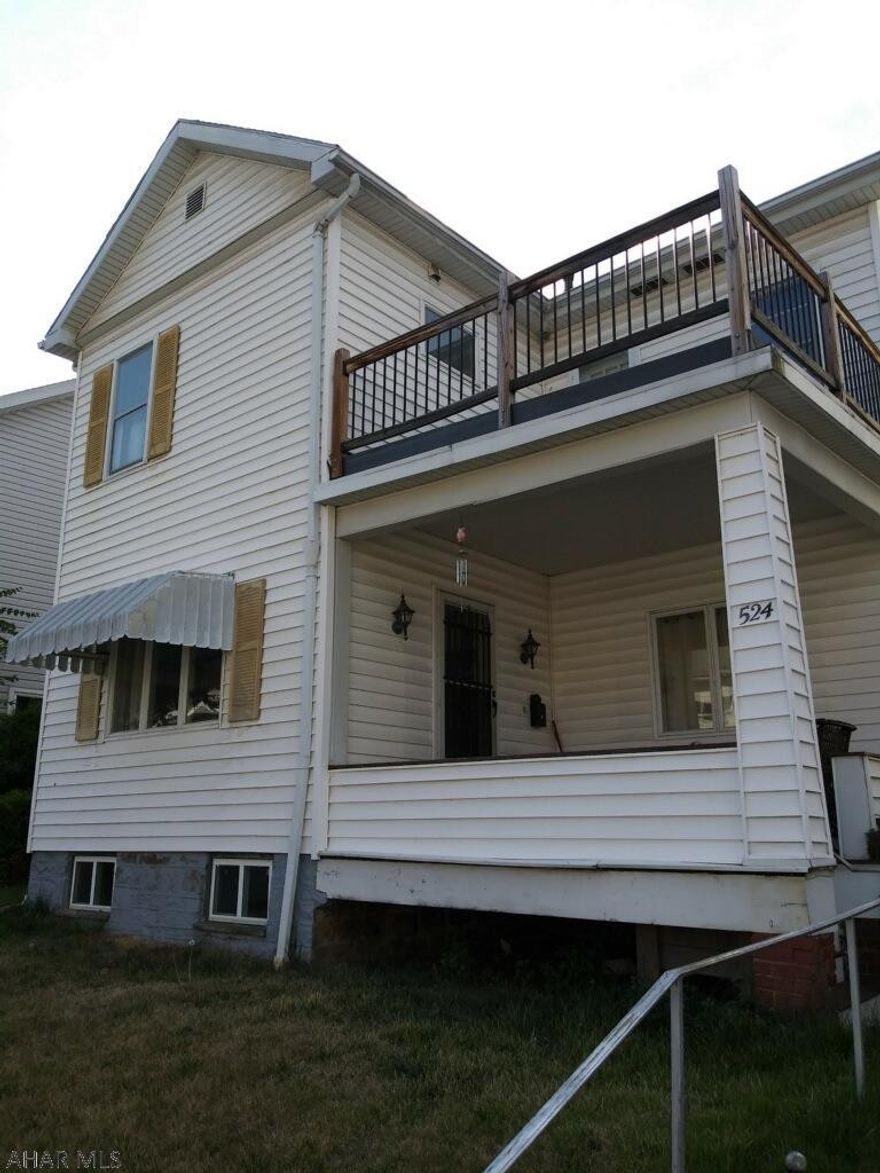 This great 3 bedroom home comes complete with a 2nd floor balcony and double lot.