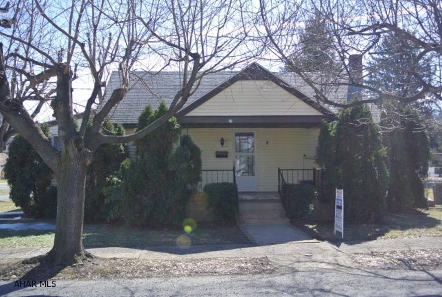 Hollidaysburg Schools. Priced right and ready for a loving owner with lots of space for everyone. This Cape Cod house boasts four bedrooms and has been freshly painted throughout and all carpets professionally cleaned (Hardwood floors under carpet).  The property includes a deep, fenced back yard, an oversized 1 car garage with storage on the upper level, a 2 level covered patio....perfect for family BBQs and relaxing with friends, an inground pool for cooling off on a hot Summer's day.  Bonus room on first floor could be a sunroom or a home office.  The location is convenient to shops and busineses on the Diamond, as well as all Hollidaysburg schools.  The laundry is currently on the first floor, but could be moved to the basement...hookups are already there!