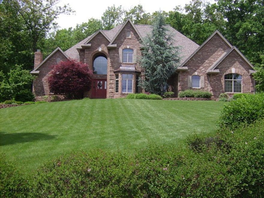 Elegant Custom Home - 6600 Sq.Ft. Finished Living Space - 5 BR, 5.5 Baths, All Brick, Arched Windows, 3-Car Heated Garage, First Floor Master Suite, Multi-Zone Radiant Heat, Security System With Sensors On All Doors & Windows, In-House Intercom System, High Velocity Central Air System W/Electric Air Cleaners.  400 AMP Electrical Service.  Enclosed Wrap-Around Porch.  Attention To Details - *See List Of Amenities.