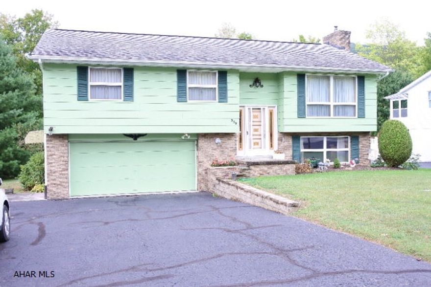 Very well maintained 1 owner split-entry, located on a quiet dead end street.  Close to Rts 22 and 764 and Foot of Ten School.  A Sunroom makes for a cheery spot for morning coffee...enjoy year round because it's heated and cooled.  All appliances stay.  Spacious 2 car garage...a great spot for a work shop! Family room boasts a gas brick fireplace...cozy spot for chilly evenings. Projected taxes for 2017 are $1891.