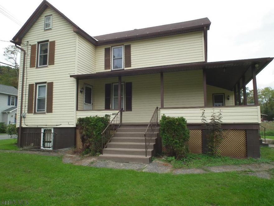Wrap around porch charm! This home sits on 2 acres in Homers Gap with modern kitchen (eat in area), living room and dining room.  Full Bath on 1st Floor.  4 bedrooms (2 are captive).  Detached 2 car garage.