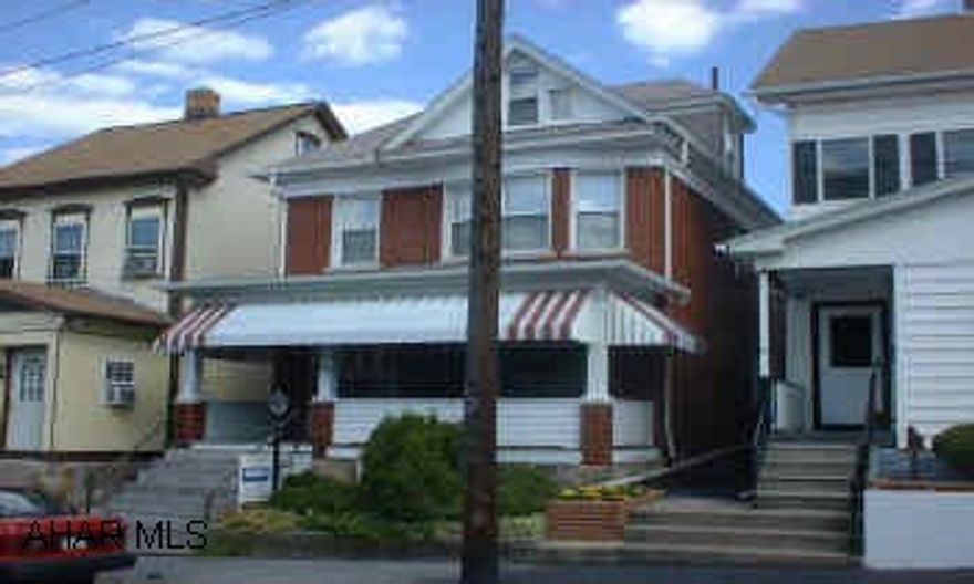 BRICK 2.5 STORY 4 BEDROOM, 2 CAR GARAGE. HAS NEW WINDOWS, NEW CARPETING. FRESHLY PAINTED. ATTIC IS HEATED AND FINISHED. COULD BE USED AS A BEDROOM.