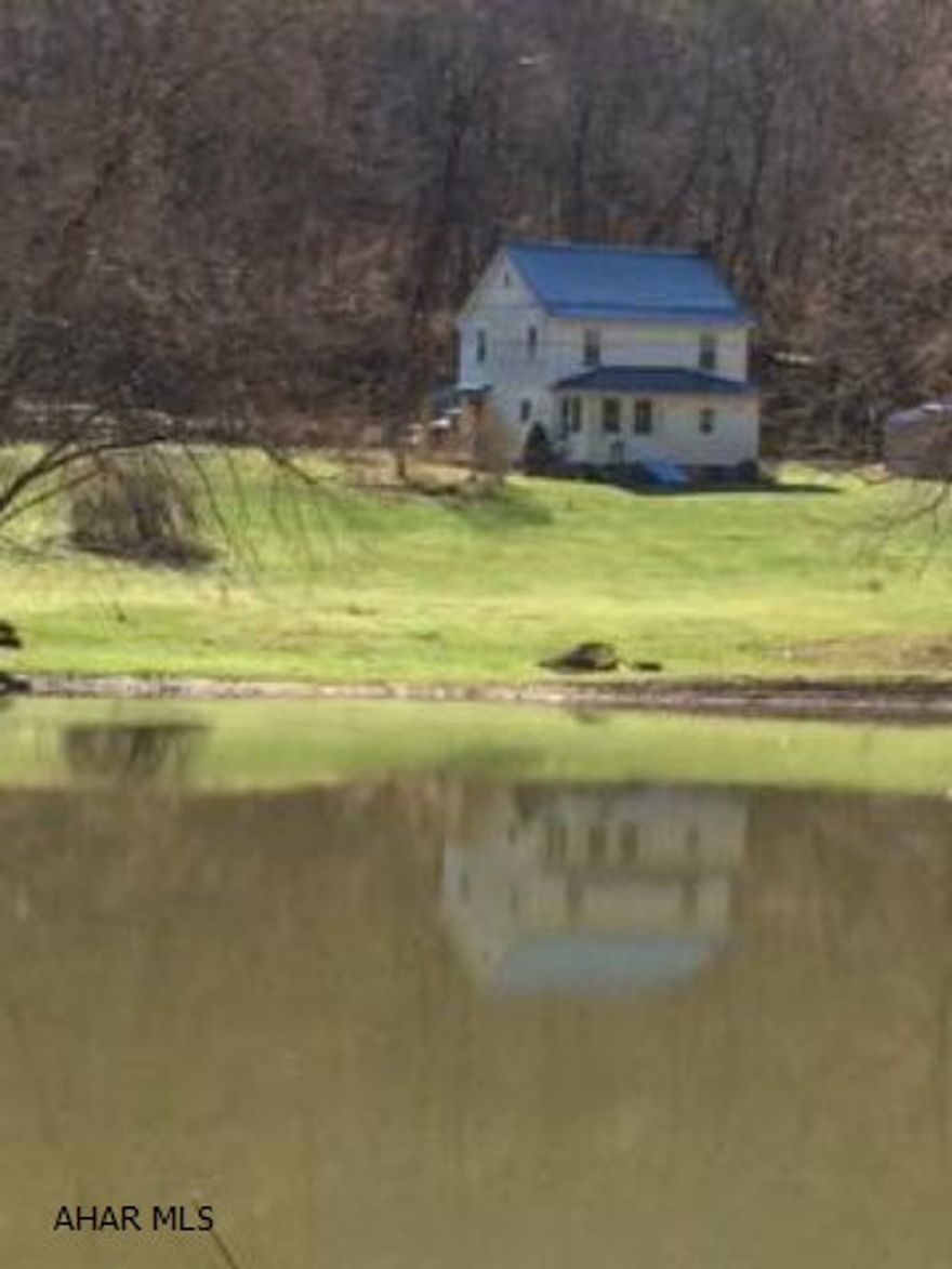Situated along the Raystown Branch of the Juniata River, up steam of Raystown lake. This home is perfect for those who enjoy privacy, having campfires by the water, fishing, kayaking/canoeing or biking as the H&B Rails to Trails is also out your front door. House is NOT in a flood zone. Being sold as is.