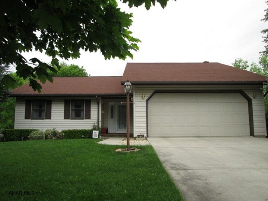 Immaculate one story that is larger than it appears.  Features include central air, hot water heat, 3 zones, and beautiful rear sunroom.  Basement is totally finished with full kitchen, bath, family room and 4th bedroom.  Screened in patio under the sunroom.