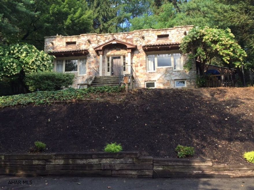 This 1 story stone house has so much character and charm. Slate patio, hardwood floors, new furnace. Rear sun porch and large family room in lower level. Worth a look!!!