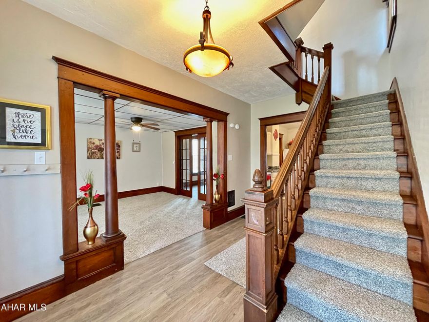 Can you say CHARMING? All the charm you could ask for with so much original woodwork in space, yet still updated and ready to move in. Home has new roof, siding, and flooring throughout. Super cute kitchen, screened in back porch, spacious bedrooms with closets, formal dining room with original pocket doors, high ceilings, Low taxes, and 2nd floor laundry. 1 year home warranty included covers all major mechanics and appliances. Come on....see it today!