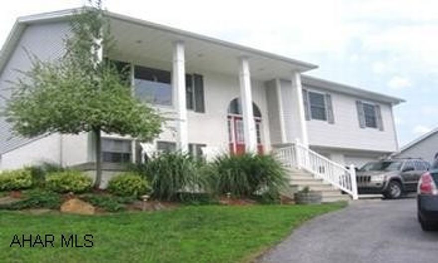 Beautiful bi-level located in Maple Hollow Estates. Home features vaulted ceilings, open floor plan, & meticulous landscaping. USDA eligible. Call Leigh 931-4555. Beautiful bi-level located in Maple Hollow Estates. Home features vaulted ceilings, open floor plan, & meticulous landscaping. USDA eligible. Call Leigh 931-4555.