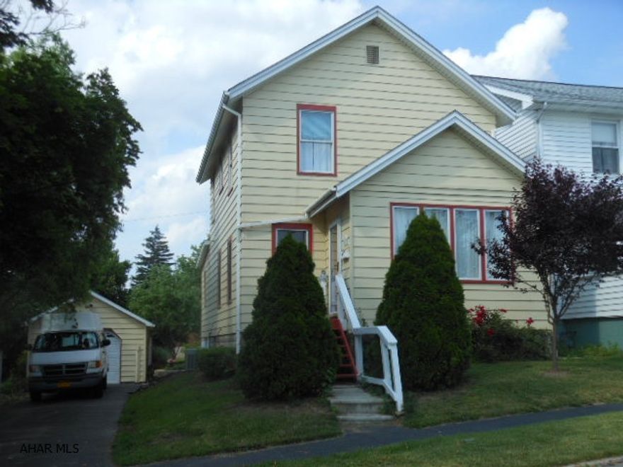 Very nice 3 bedroom, 2 bath home on lovely landscaped lot with detached garage. Large living room and dining area . Light and bright eat-in kitchen  that open to family room and also to back yard.  Large walk up attic for storage that could be finished. Large basement that opens to driveway and yard. .....This is a very darling home !