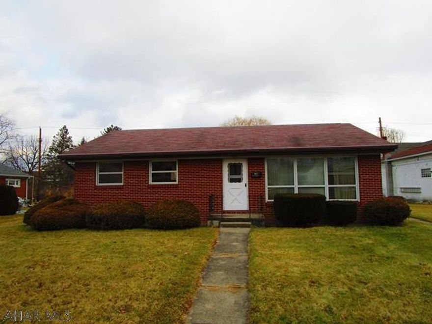 Great starter home or investment. Hardwood floors, water proofed basement, rear alley access, carport, 2 bedrooms, 1 bath, priced to sell.