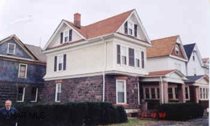 IMMACULATE INCHANTING BROWNSTONE HOME W/STAINED GLASS WINDOWS. NEW ROOF, WINDOWS, HOT WATER HEATER & ELECTRIC. CEMENT DRIVE WAY & NICELY LANDSCAPED. MOVE RIGHT IN.