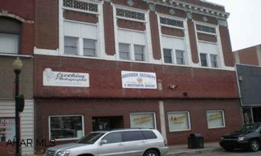 Former JK Sports building. Storefront with commercial rental spacce. Former JK Sports building. Storefront with commercial rental space.