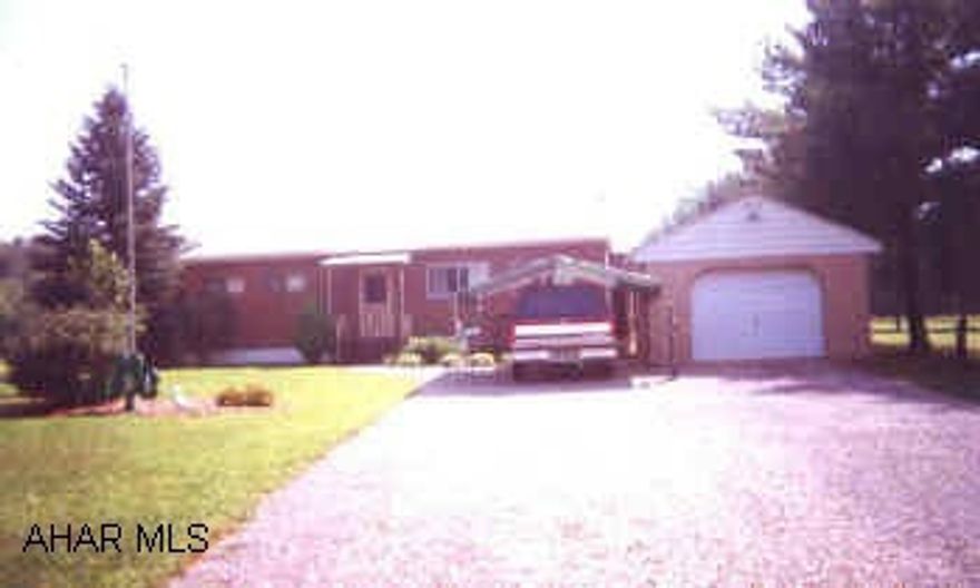 VERY NICE 3BR SINGLEWIDE W/ OFFICE AND 10' X 40' ADDITION. PERMANENTLY ERECTED ON 6 ACRES, 1 CAR GARAGE, INCLUDES 24X48 BLDG. W/  WORKSHOP AND 12X15 ADDITION ON REAR & VERY NICE RENTED 1 BR APT & 1 CAR GARAGE.  WELL TAKEN CARE OF.  DEED NOT TITLE.  CALL CRYSTAL FOR SHOWINGS.