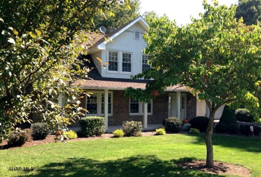 The charm, character & historical value found throughout this home make it one of those priceless gems that one has to see to truly appreciate. Upon entry, the large formal foyer sets the tone. The home's original stone historical fireplace, bar and solid wood floors grace the formal living areas while the stunning spacious kitchen with chestnut cupboards, granite countertops & tile floors will delight the most discriminating buyer. The main floor family room & sunrooms look onto a manicured yard complete with flowing waterfalls and large terrace. Lower level recreation room, bathroom & bar. Upstairs 4 bedrooms & 2 bath all are enhanced by the incredible finer details of this home.