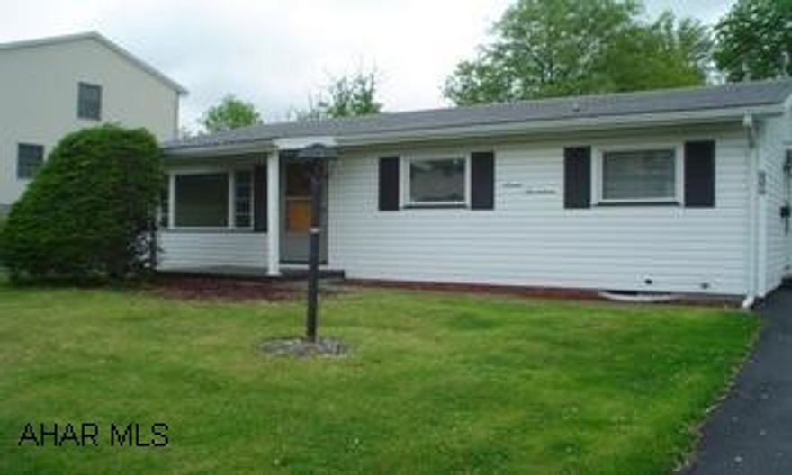 2BR Ranch w/1 car det. garage on level lot in great neighborhood with whole house A/C. New carpet & paint throughout.
